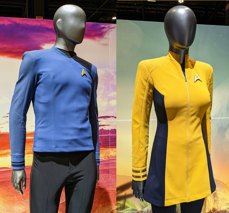 Two example uniforms, one with a shirt and pants and the other with a skirt and leggings. They are colored bright blue and gold respectively.